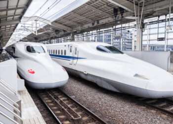 Kyoto, Japan - January 21, 2017: Tokaido Shinkansen bullet trains stopping at Kyoto Station.